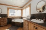 Dual vanities & tons of amenities in the primary bathroom 